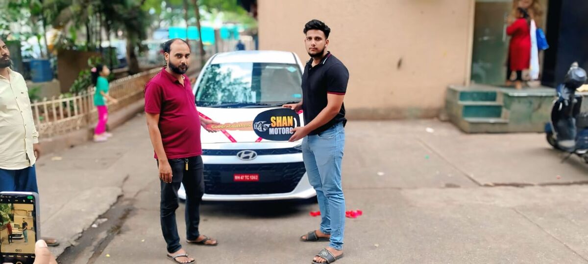 Happy customer with new car